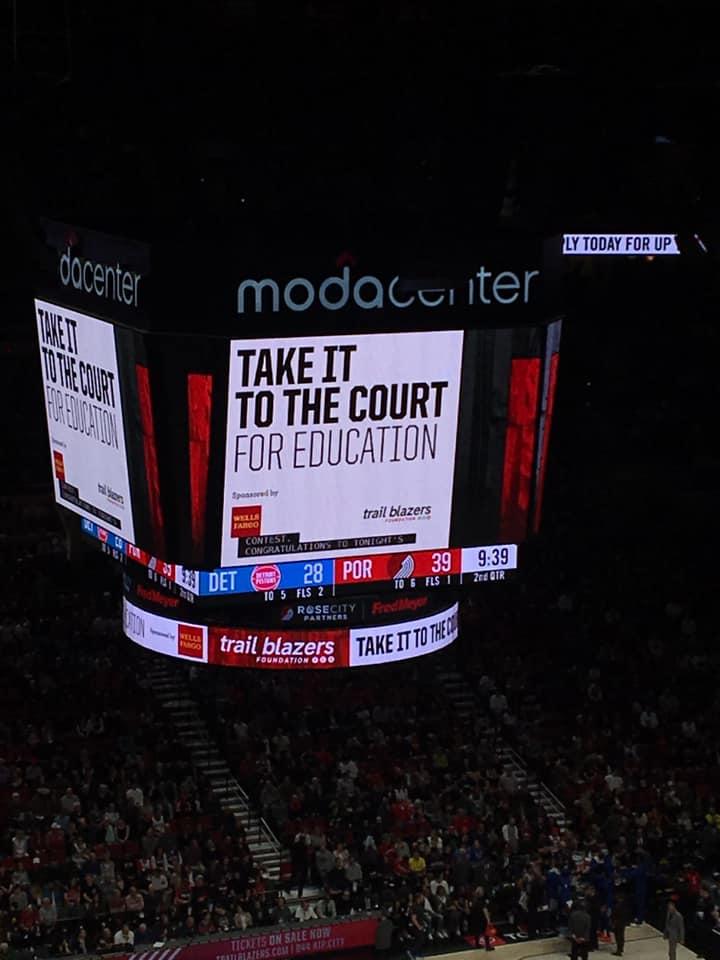 View of the score board announcing the donation from the Trail Blazers