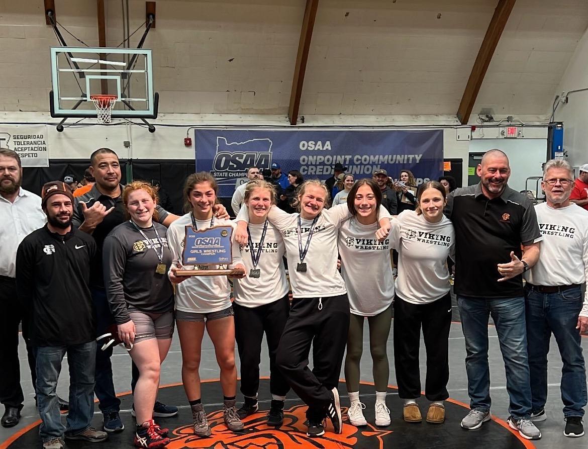 State Champion FGHS girls wrestling team and coaches